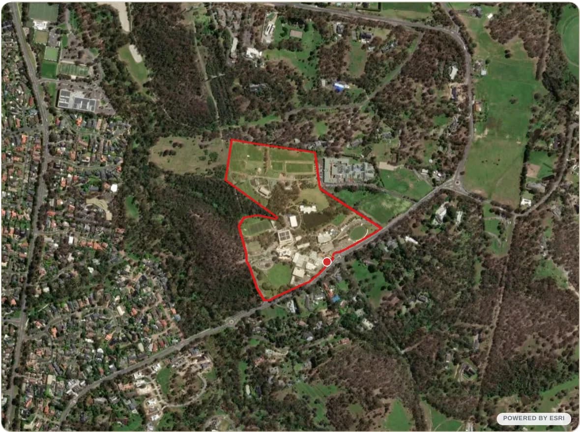 Actual sample report map showing satellite imagery with the mapped property boundary outlined